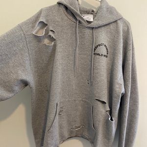 “Respect Women Worldwide” Distressed Pullover